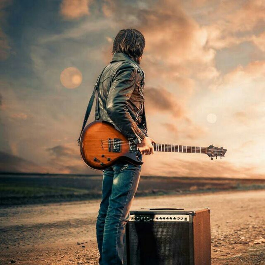 Мужчина с электрогитарой