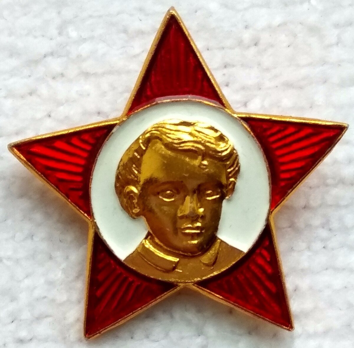 Ленин на значке октябренка