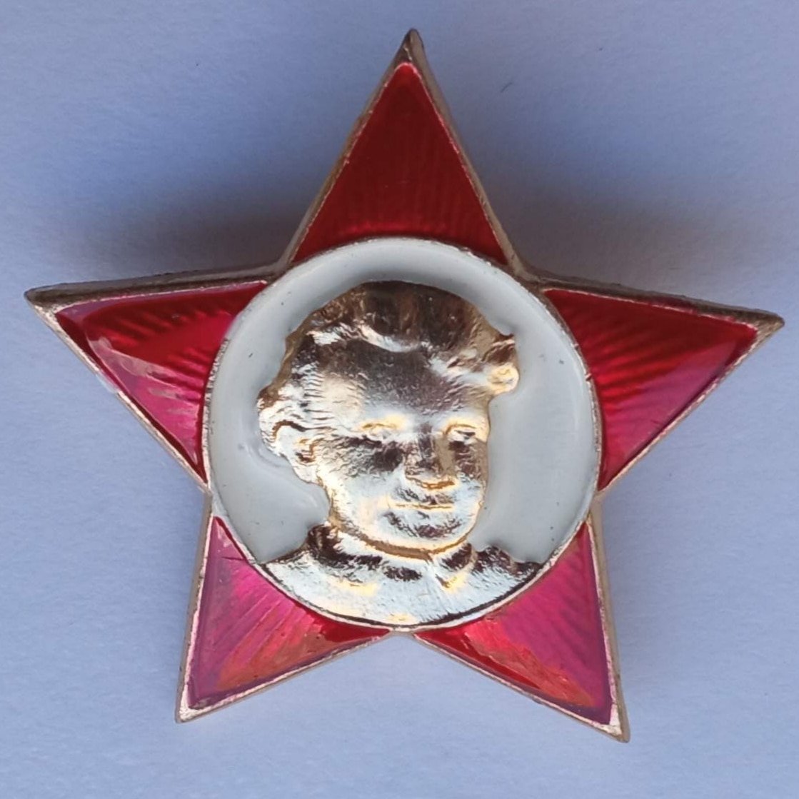 Ленин на значке октябренка