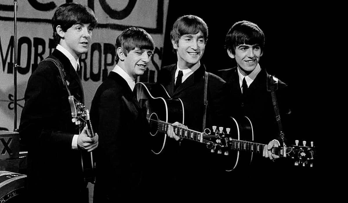 Солист Битлз