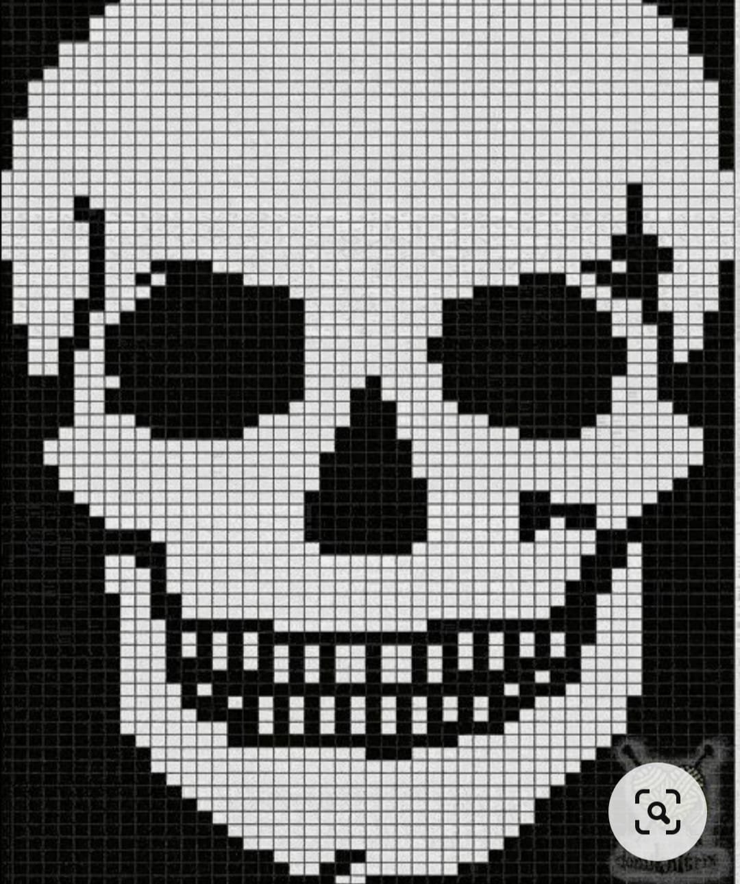 Череп по клеточкам в тетради