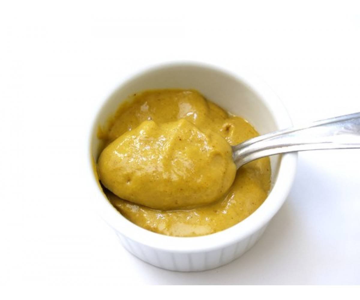 Семена горчицы в ложке