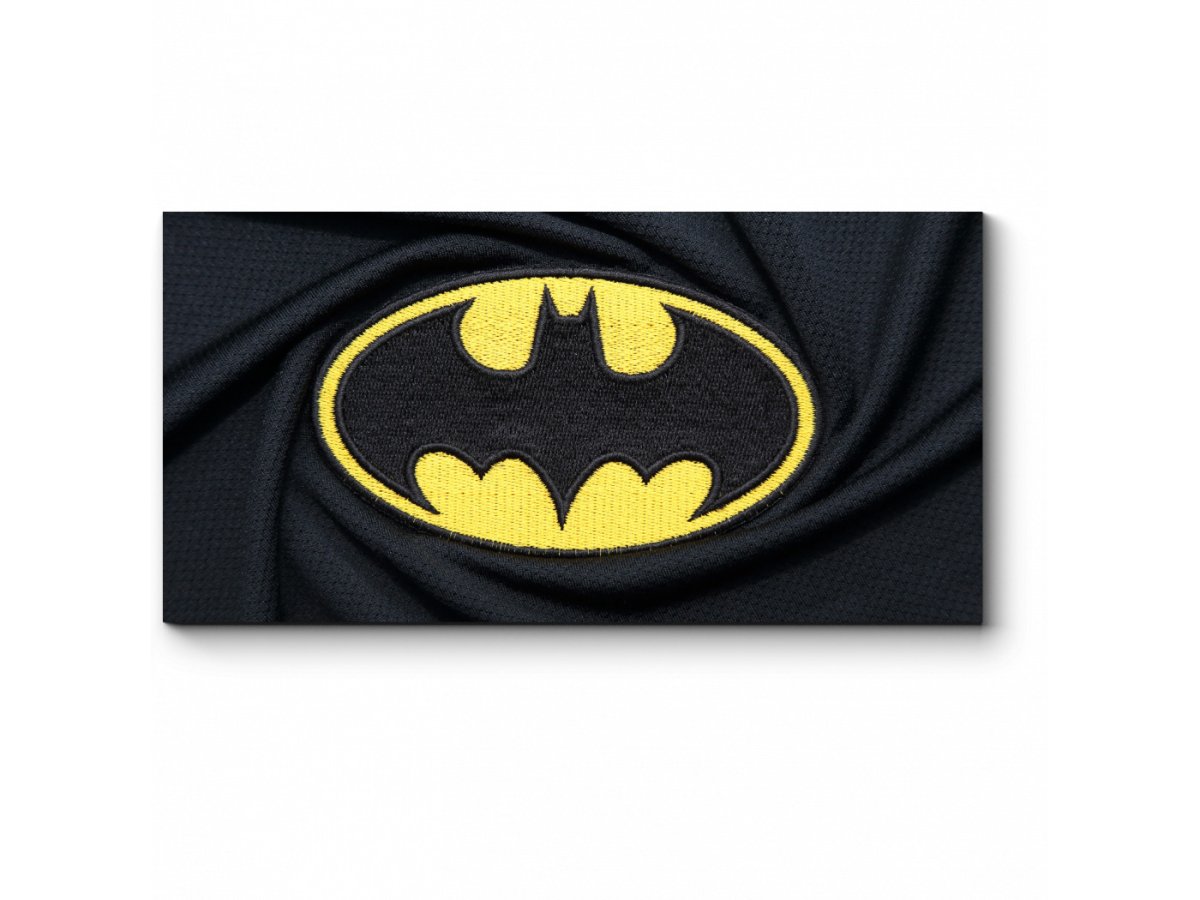 Знак Бэтмена на черном фоне