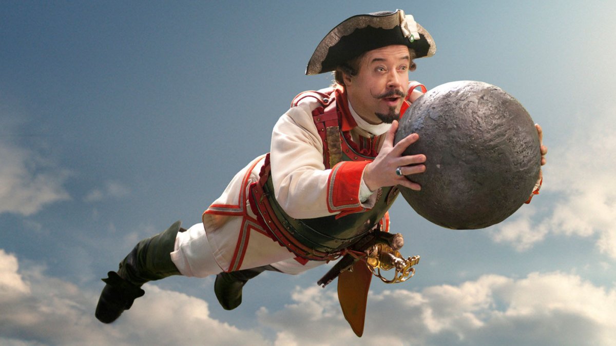 Барон Мюнхгаузен верхом на акуле