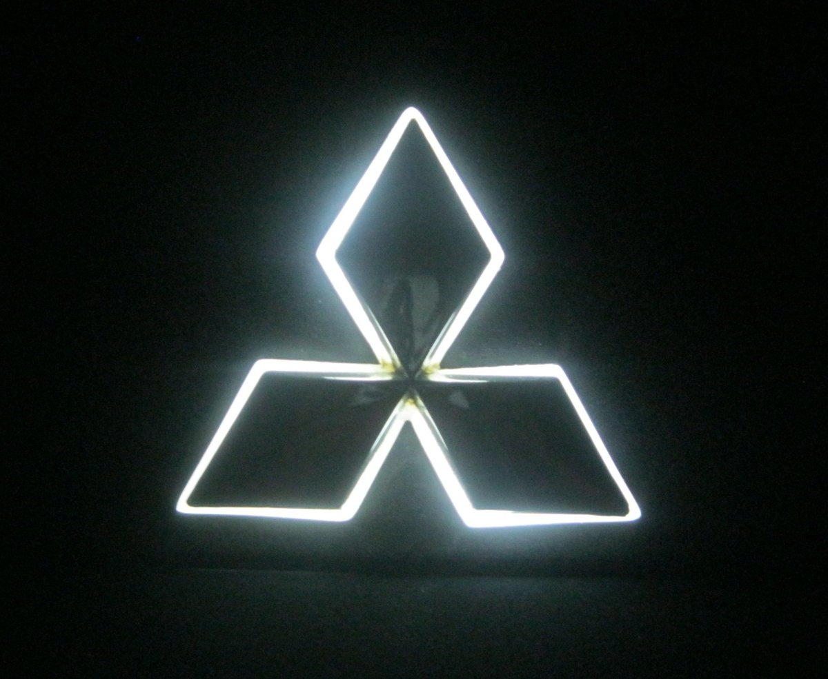 Знак Митсубиси Лансер