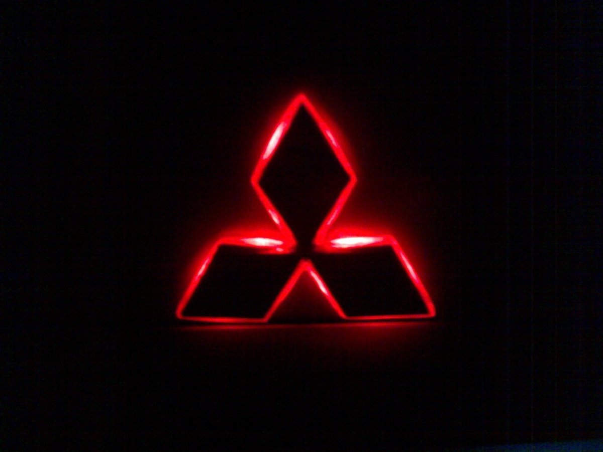 Значок Мицубиси Лансер 10