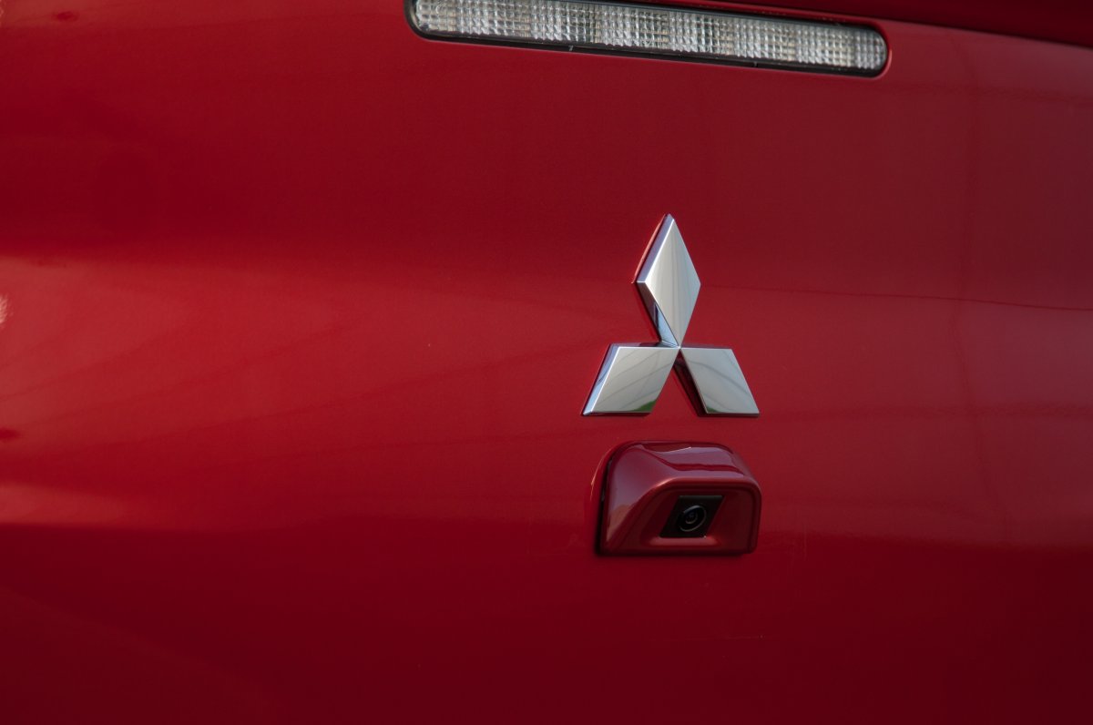 Значок машины Митсубиси