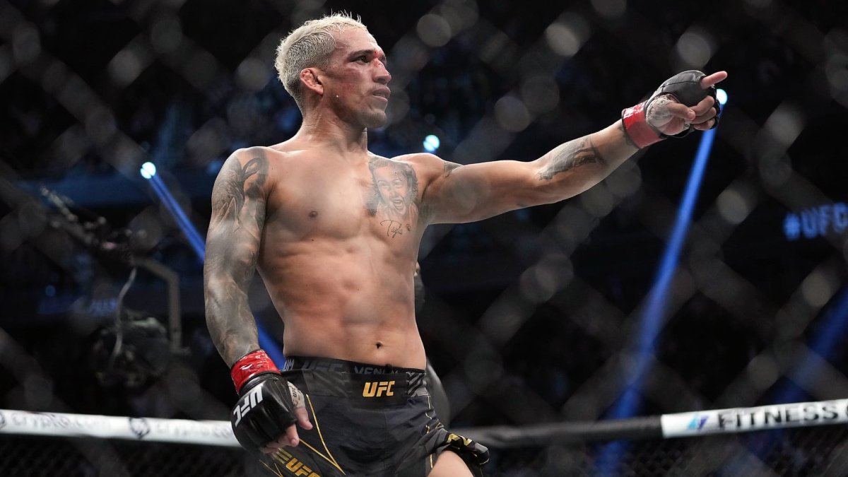 Чарльз Оливейра с женой