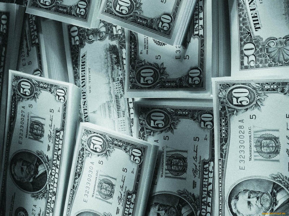 Куча долларов на черном фоне