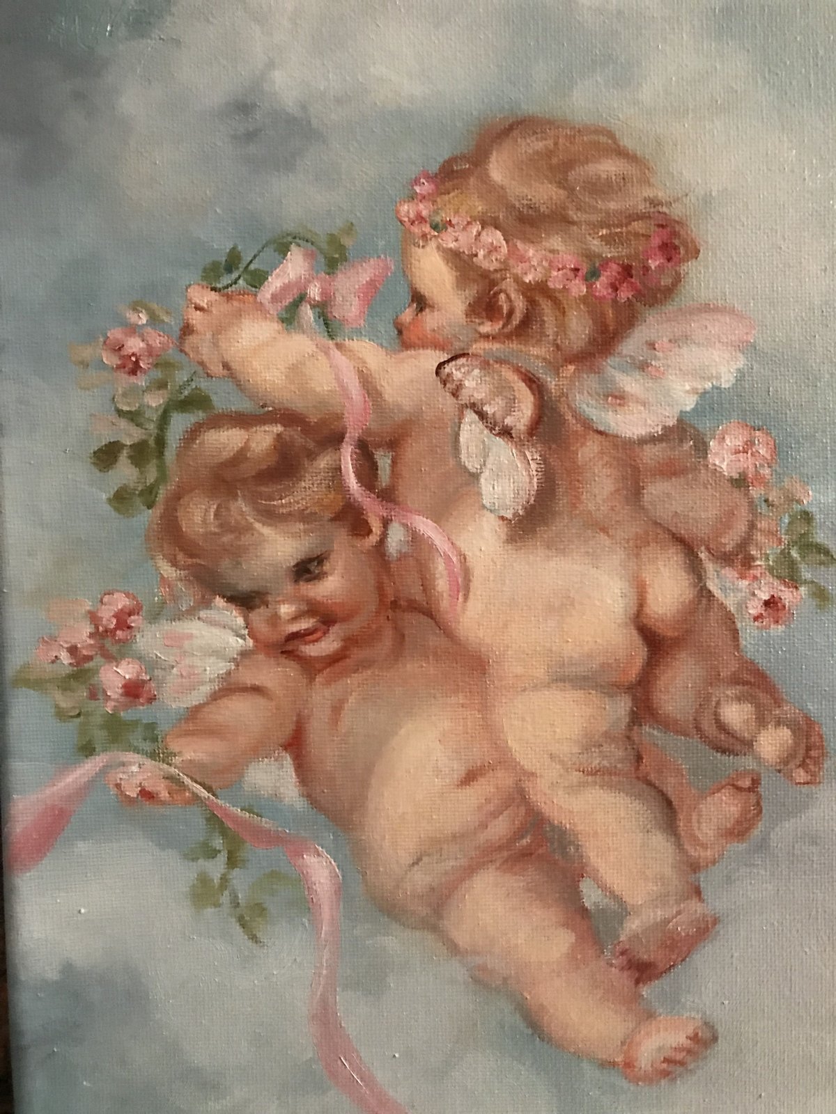 Ангел с сердечком в руках