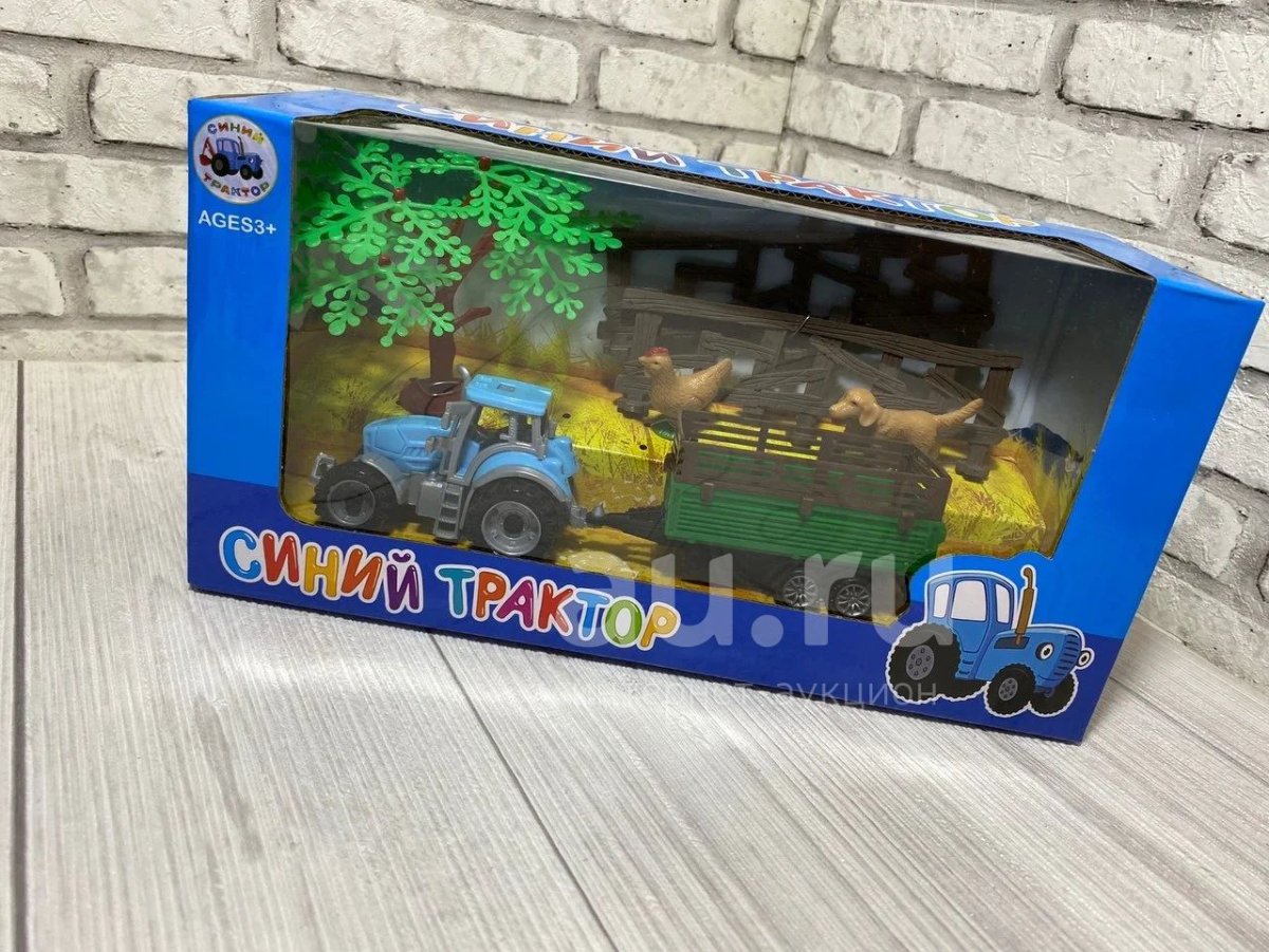 Трактор с прицепом синий